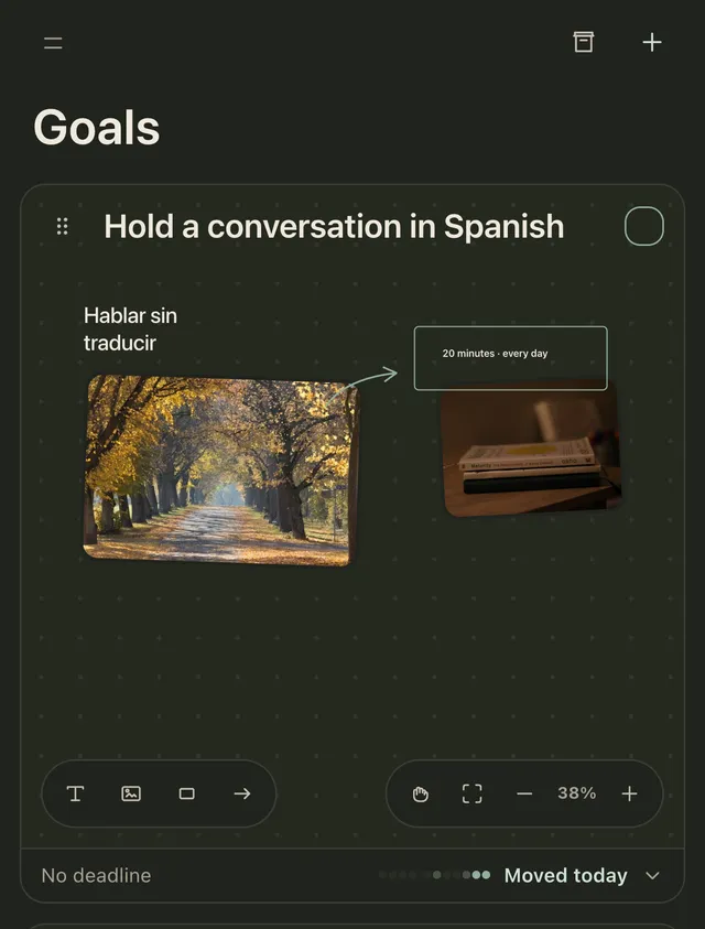 A goal board on an iPhone: a title, two photos, a handwritten note, a framed note and an arrow, with the toolbar at the bottom.